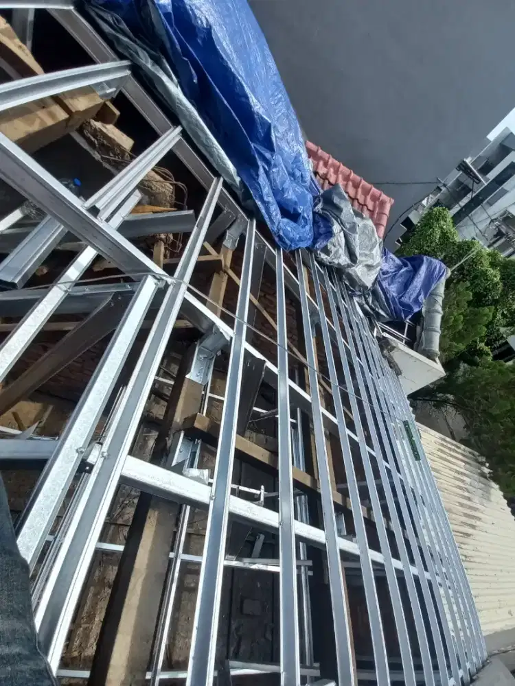 Tukang bangunan,perbaikan atap bocor,dag,talang,kanopi,renopasi,dll