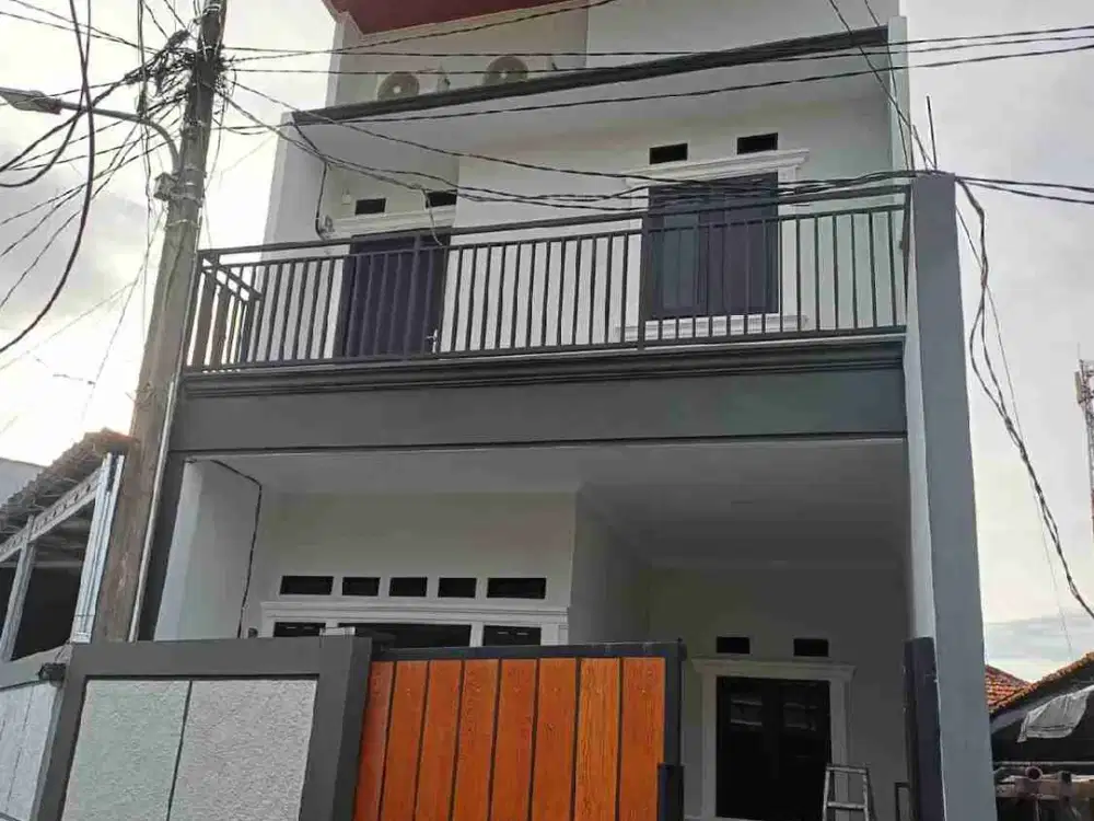 Rumah Minimalis Lokasi Strategis di Caman Raya Utara