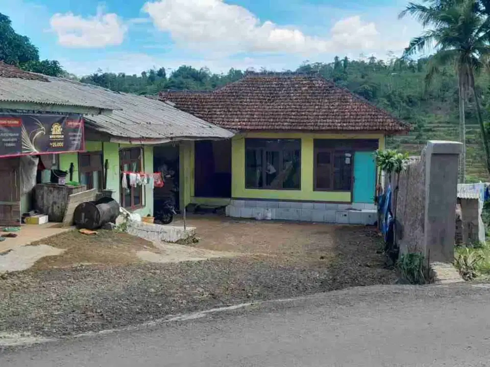 dijual rumah pinggir jalan raya