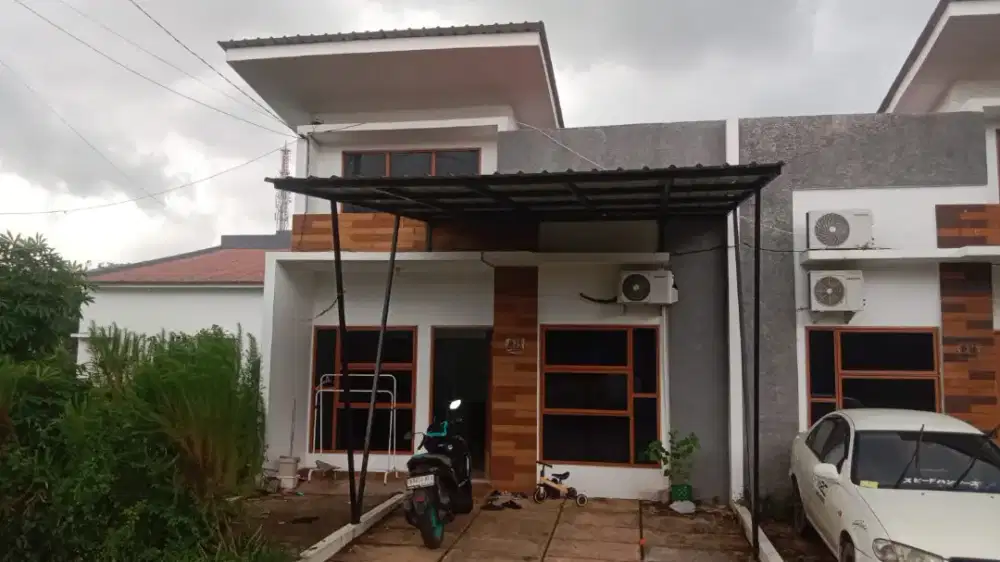 Over kredit rumah