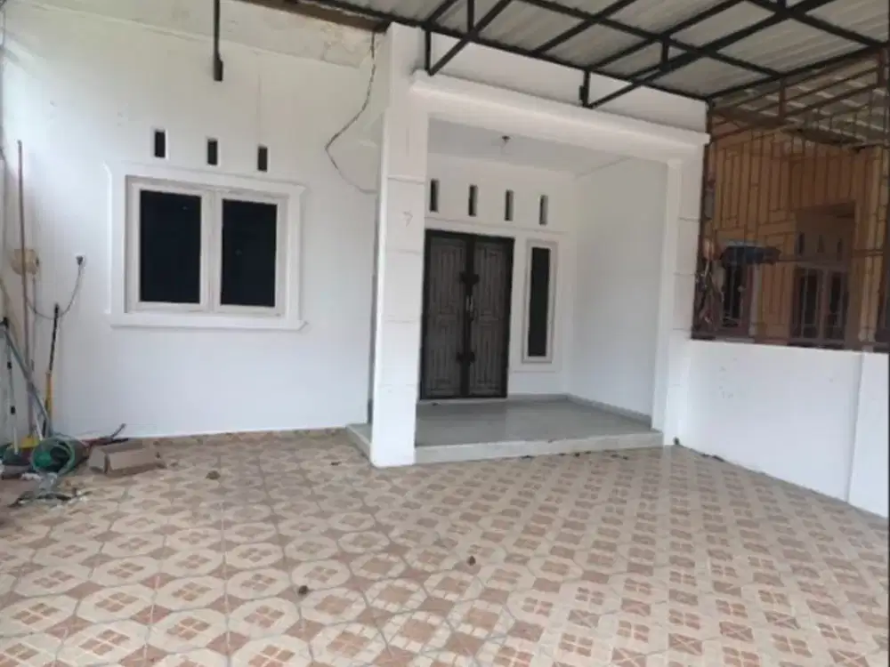 Rumah di kayu manis, Pekanbaru