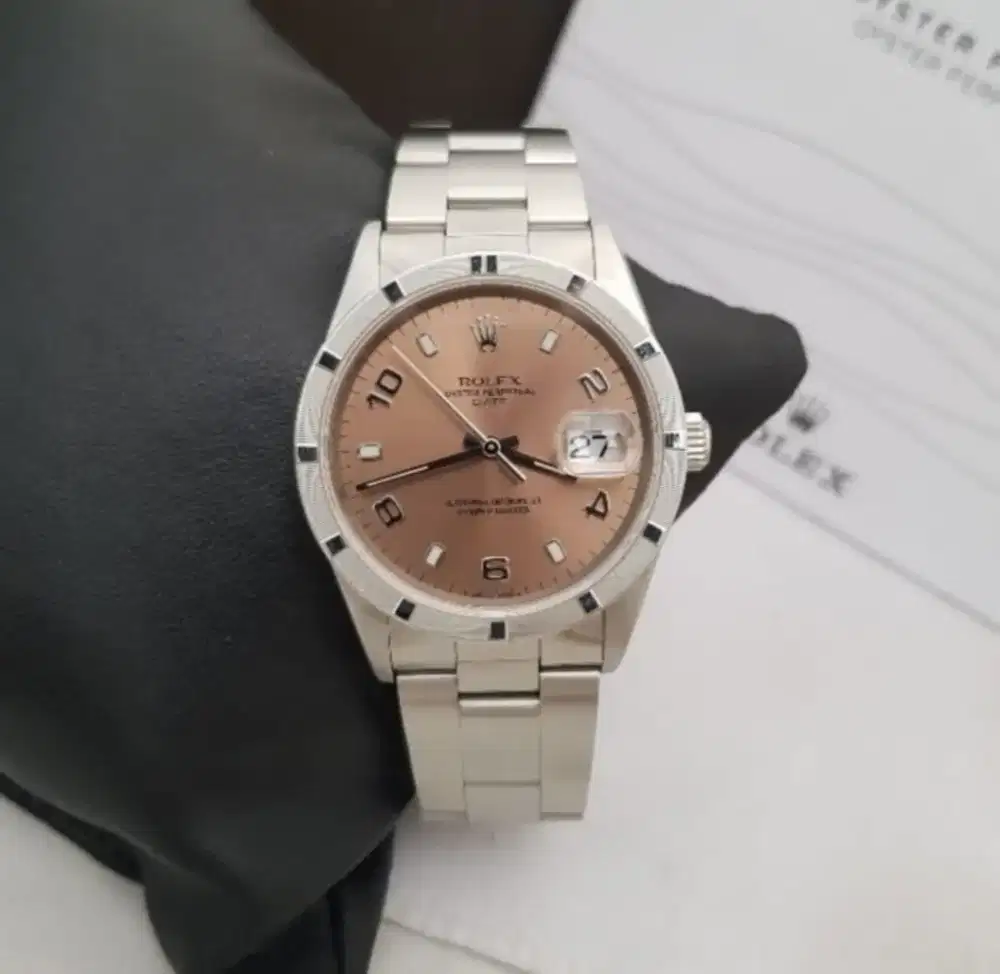 ROLEX 
OYSTER PERPETUAL DATE