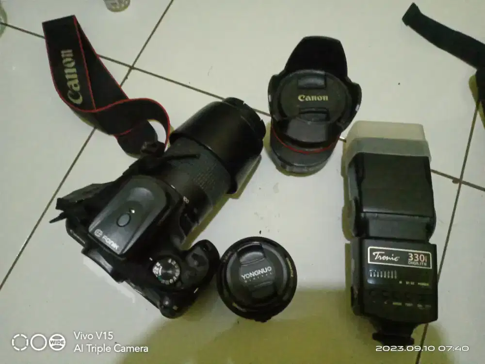 Canon D1300 lensa ada 3