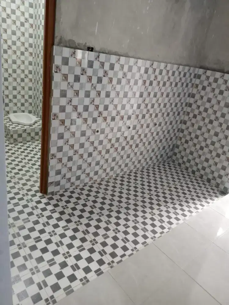 Pemasangan keramik granit