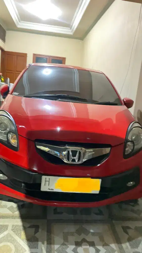 JUAL HONDA BRIO MANUAL MERAH TERAWAT 2015