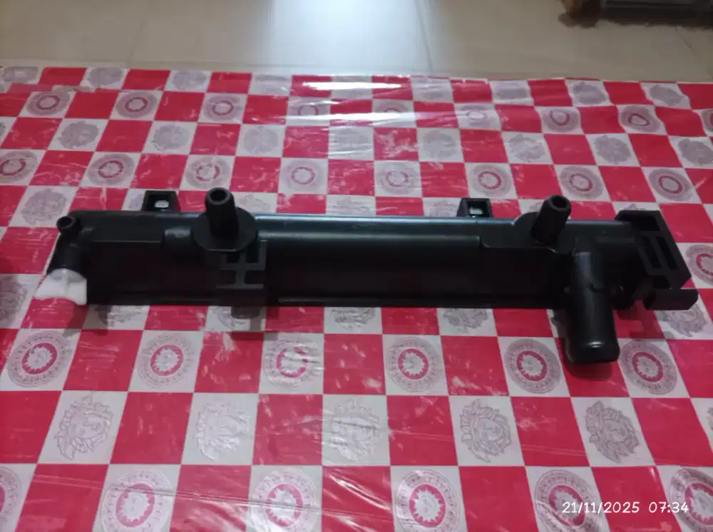 LOWER TANK RADIATOR MOBIL AGYA 1000cc