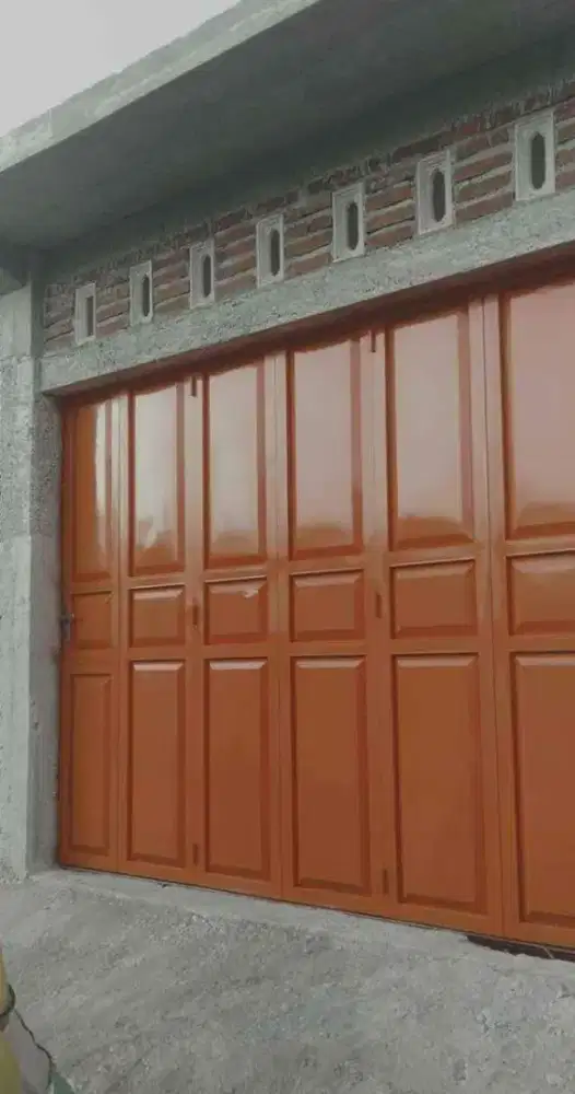 Pintu garasi sleding belok