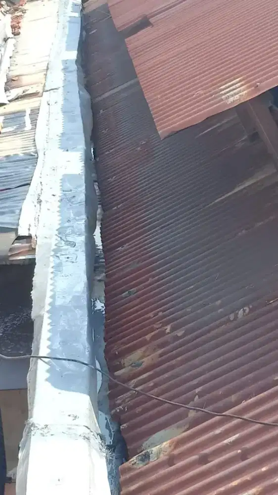 Tukang talang & perbaikan kebocoran.