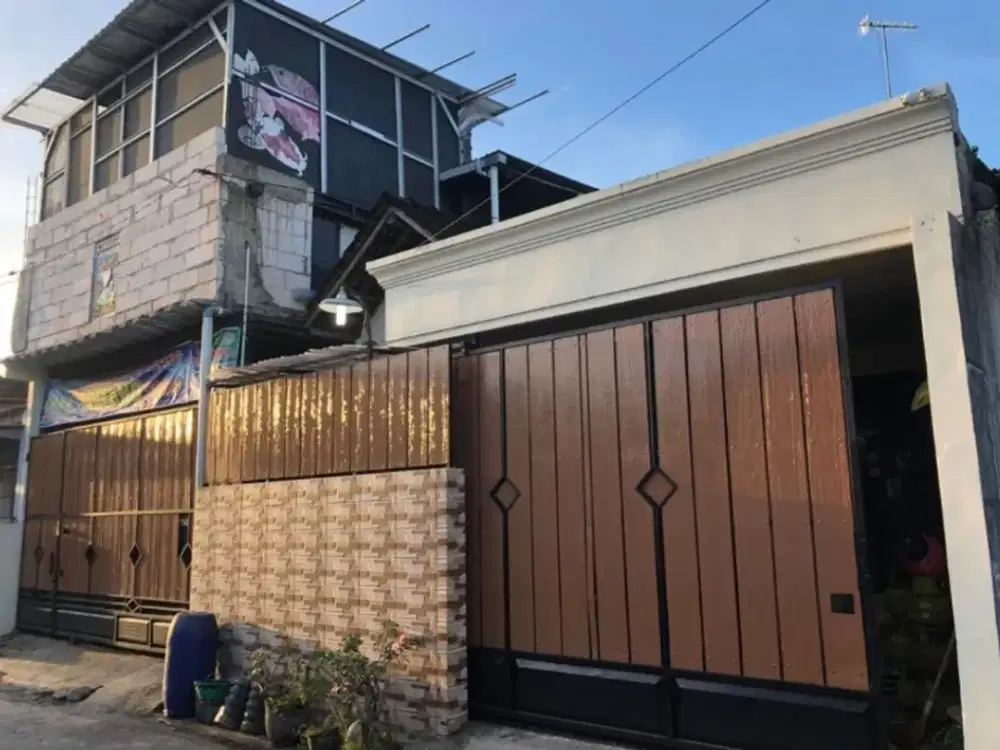 Rumah 1,5 lantai lokasi di Gentan Baki lingkungan Kampung