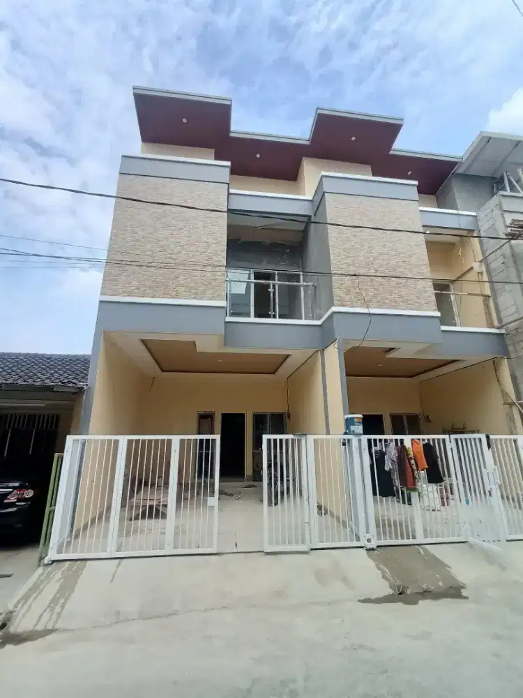 Rumah dua lantai perum harapan indah bekasi barat