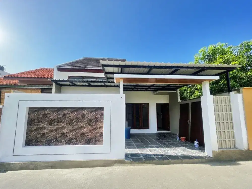 rumah progres finishing lingkungan perumahan lokasi ngemplak kartasura dekat kampus UIN