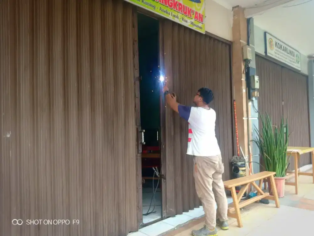 Perbaikan rolling door folding gate depok