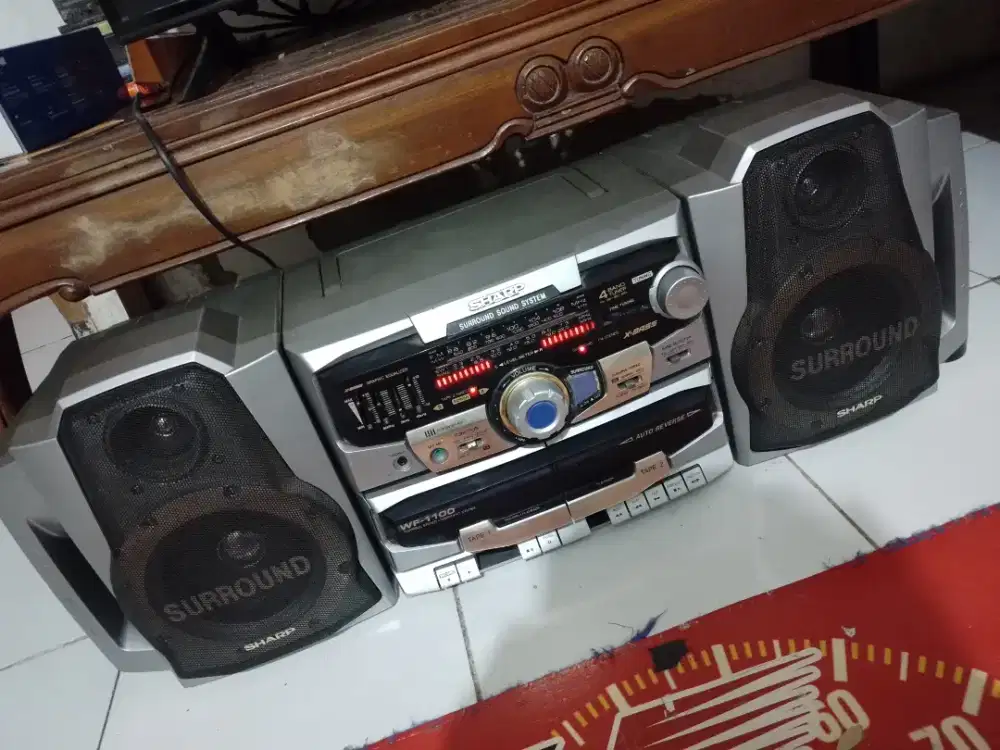 Compo Sharp simba, radio, kaset, dan aux semua normal.