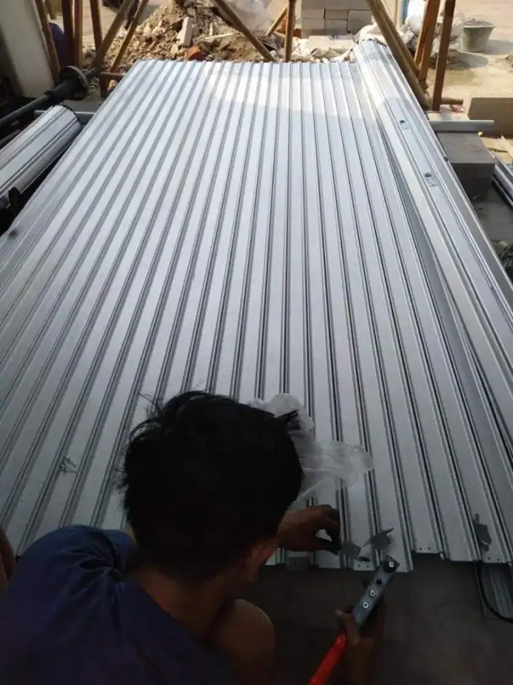 Tukang spesialis rolling door folding gate murah
