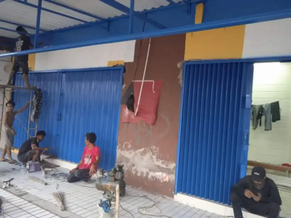 Tukang service reparasi rolling door folding gate