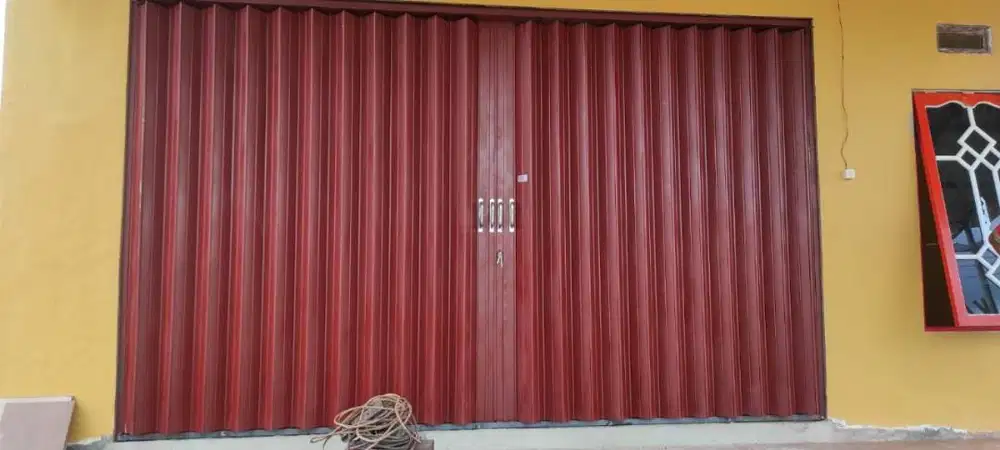 Pembuatan Pintu Ruko murah dan berkualitas yani steel