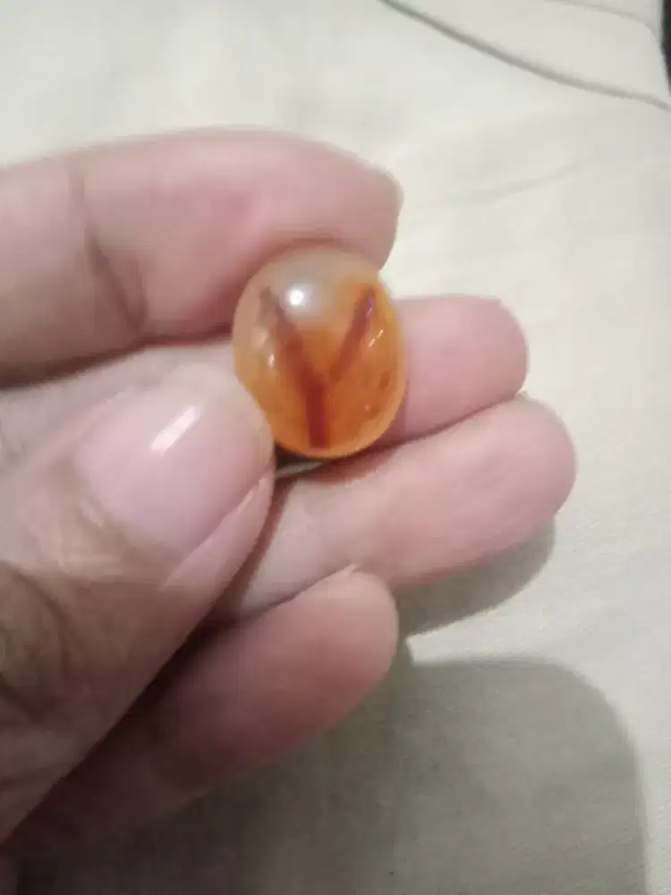 Batu bergambar inisial huruf