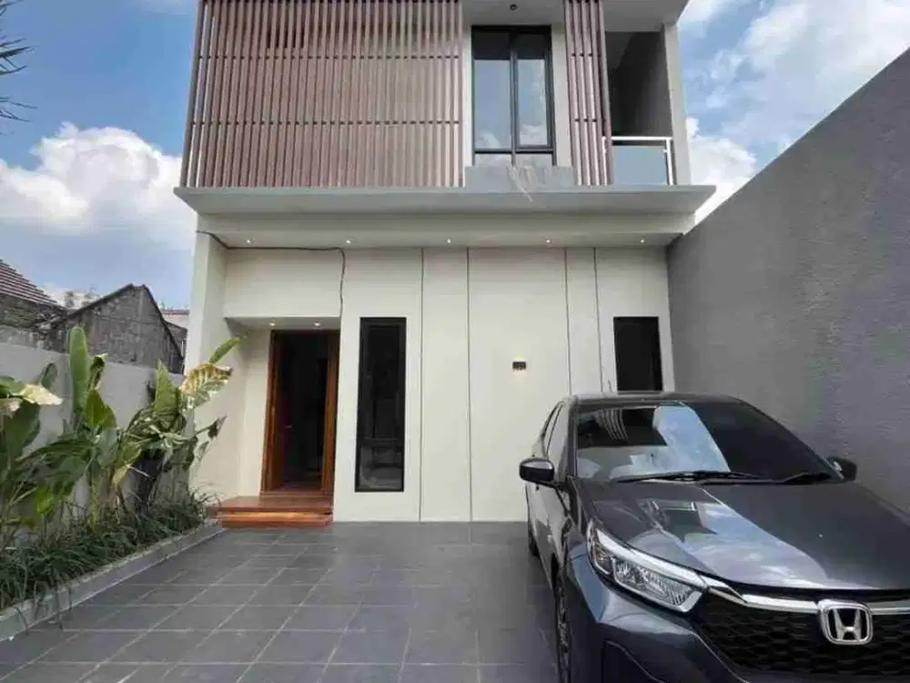 RUMAH MEWAH KONTEMPORER 2 LANTAI MODERN DAN STRATEGIS DI WEDOMARTANI NGEMPLAK