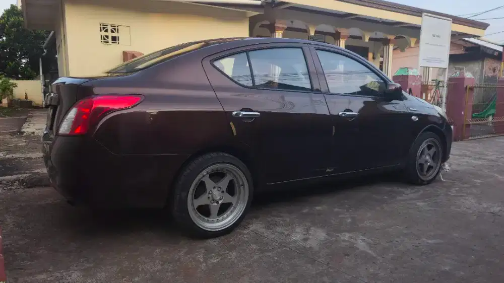 Jual Cepat BU Nissan Almera 2013 Bensin Kesayangan