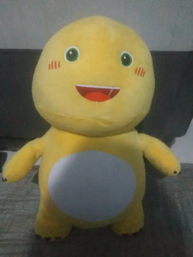 Boneka dino kuning