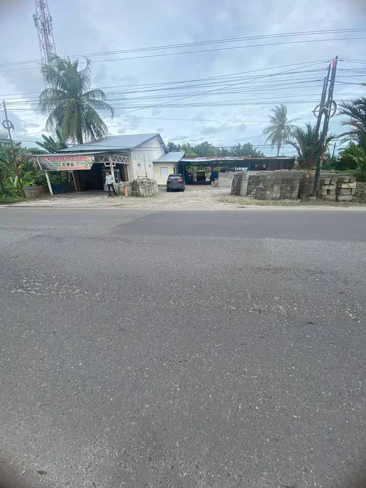 LOKASI STRATEGIS PINGGIR JALAN BESAR TANAH DAN BANGUNAN