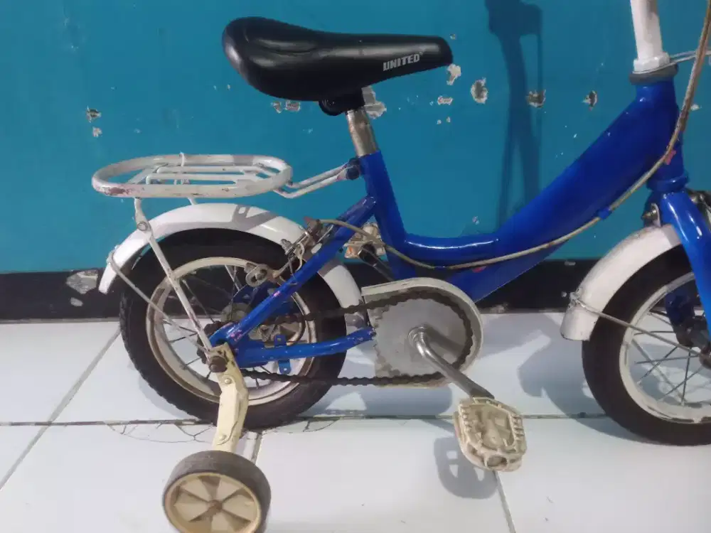 Sepeda anak united roda 4 ring 12