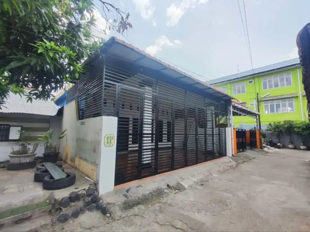 Disewakan rumah di jalan garu 3 SM Raja, kamar tidur 4, kamar mandi 3