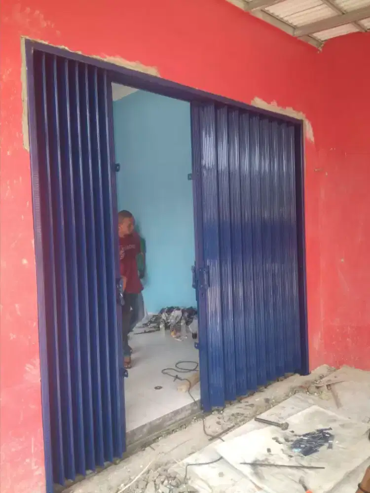 Rolling door galvanis folding gate baru