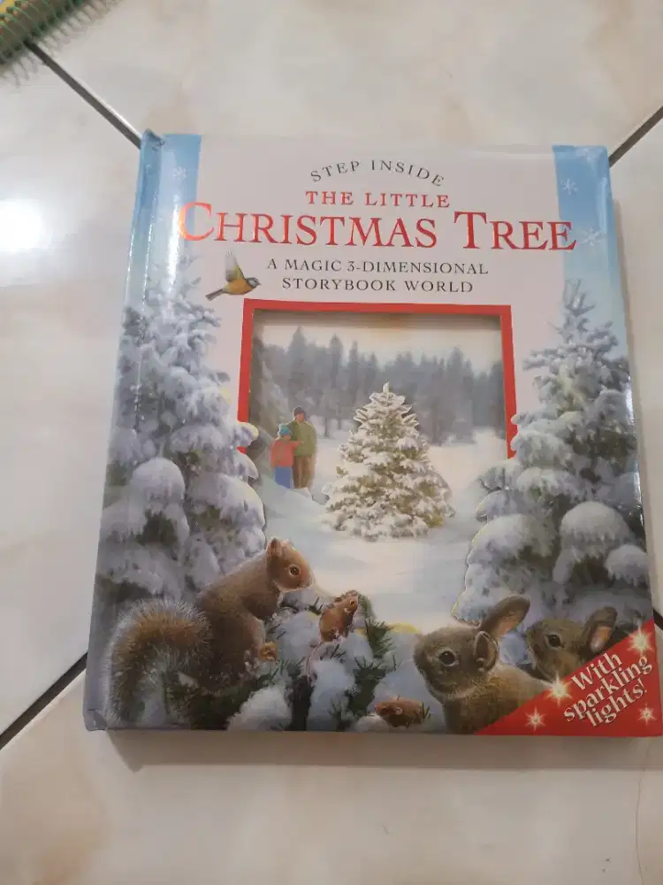 Buku natal the little Christmas Tree step inside