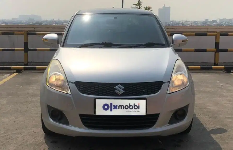 TDP 6,JT Suzuki Swift 1.4 GX Bensin-MT Silver 2013