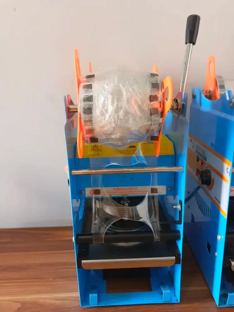 Alat press gelas plastik