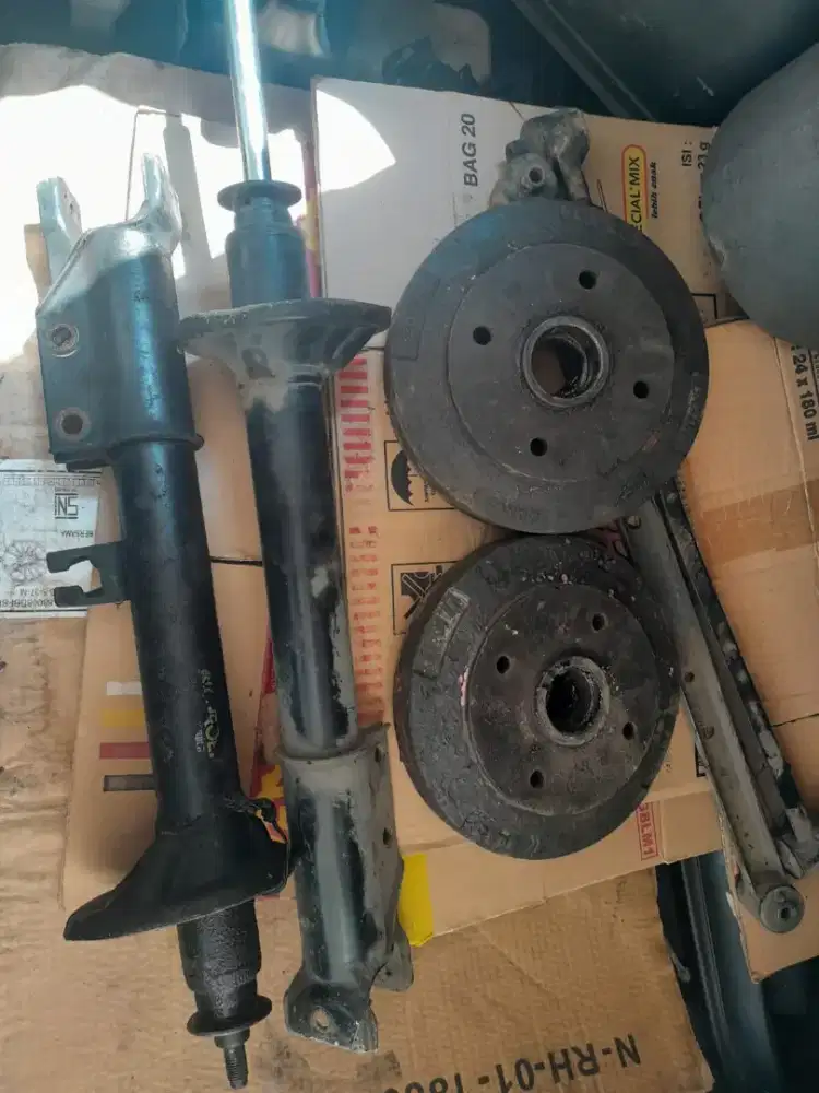 Part bekas mazda 323/ford laser