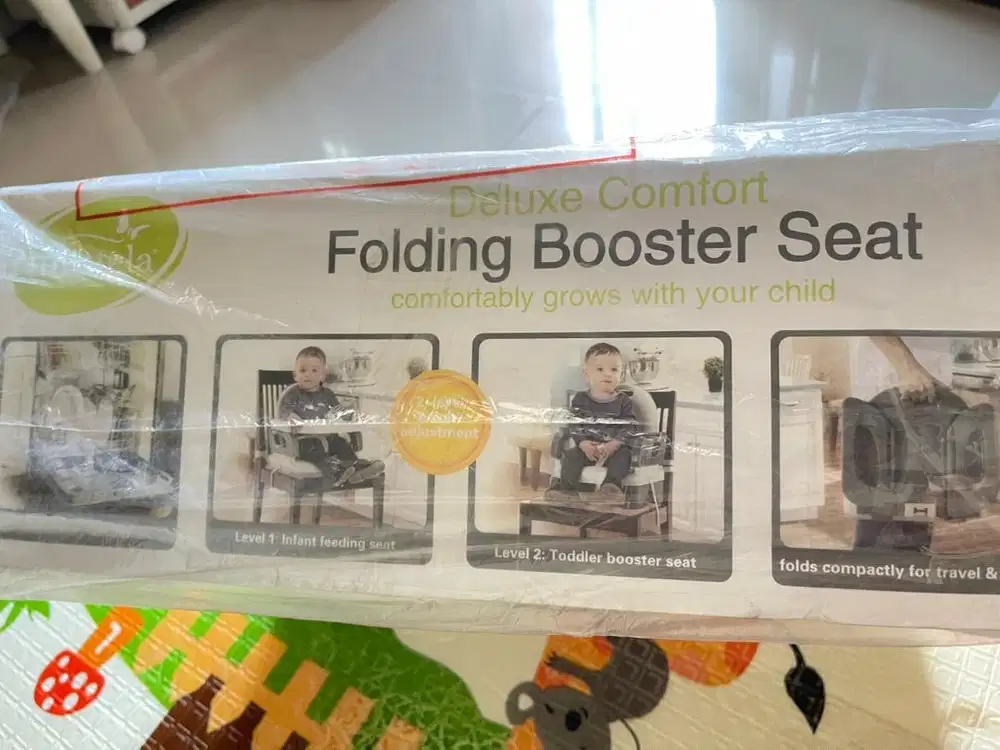 Folding boster seat mastela