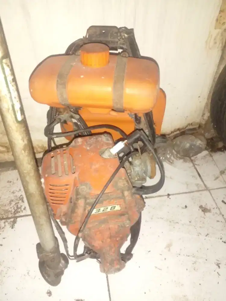 mesin rumput merk tanaka 328