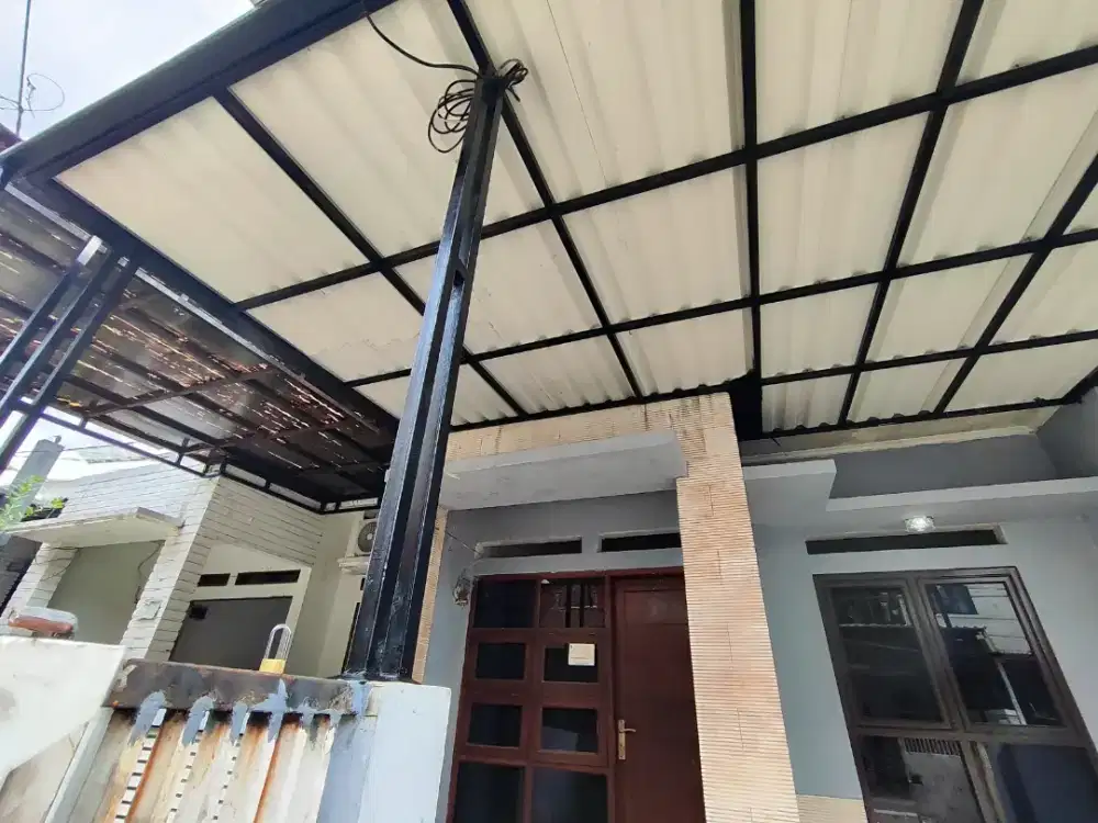 Rumah di linkungan tenang dalam cluster