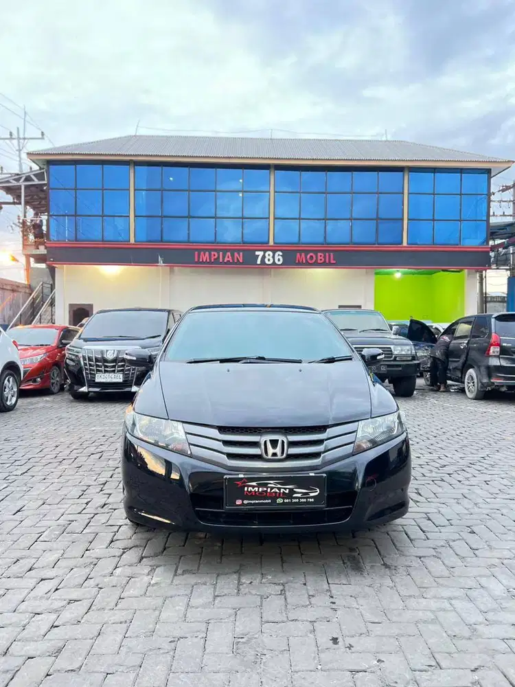 TDP 20JT Honda City E Automatic Hitam 2010 camry brio confero ignis