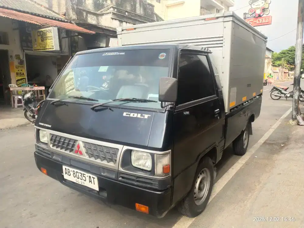 L 300 box 2014 AB an. Perorangan.