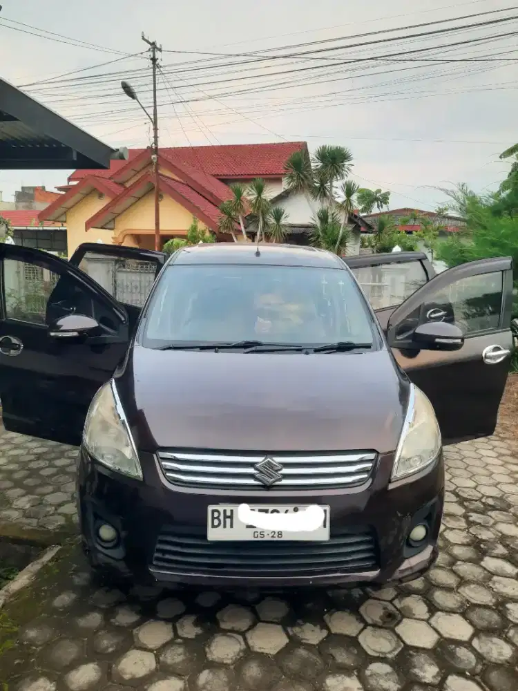 Suzuki Ertiga 2013 Manual Merah Metalik
