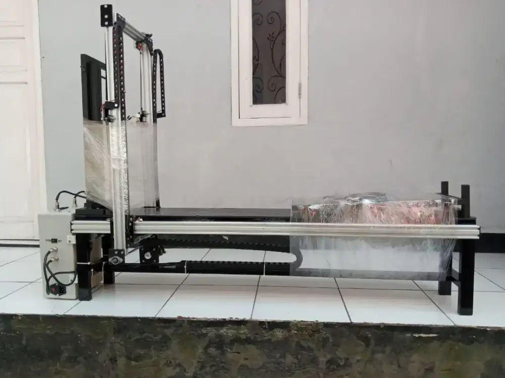 Mesin cnc potong gabus otomatis