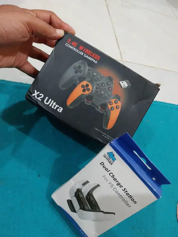 FOR SALE GAMEEPAD WIRELESS X2 ULTRA FREE CHARGER STATION