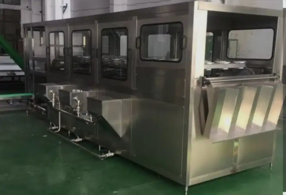 Mesin washer dan filling galon otomatis