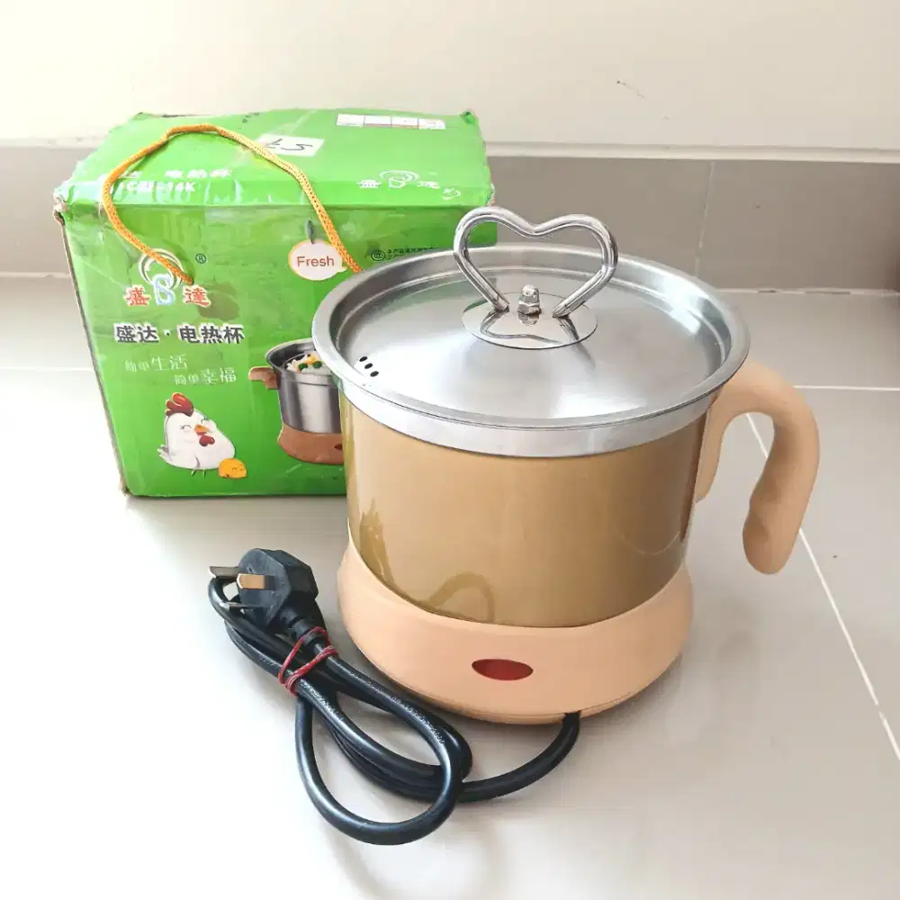 Panci elektrik Shengda 1,15L, bekas