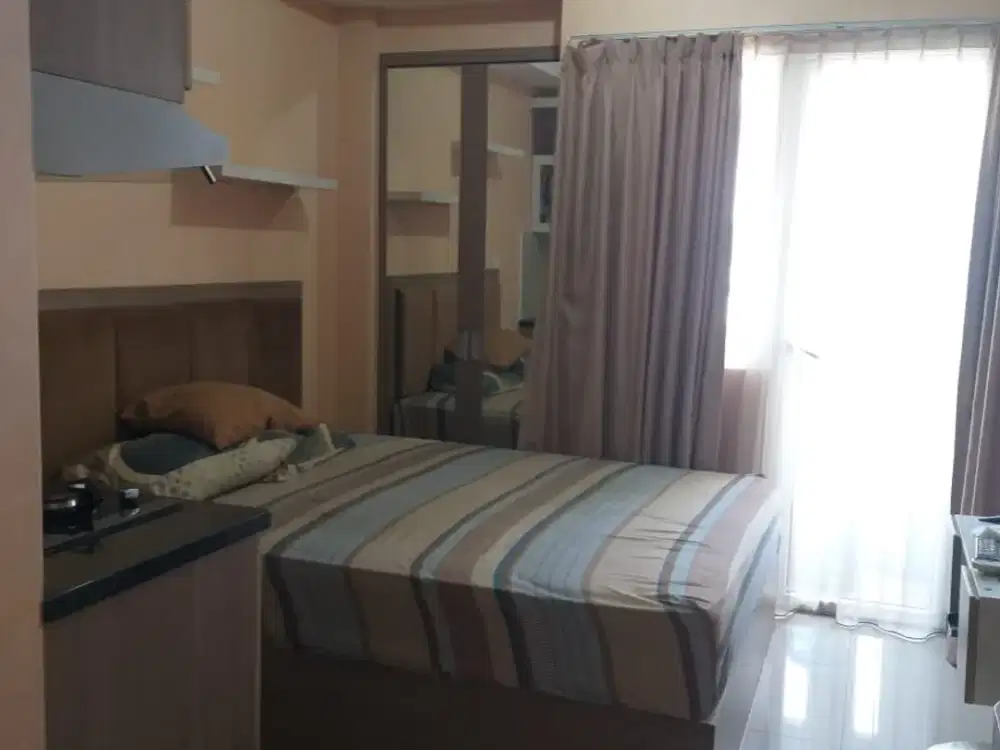 The green pramuka residence unit studio full furnished bagus