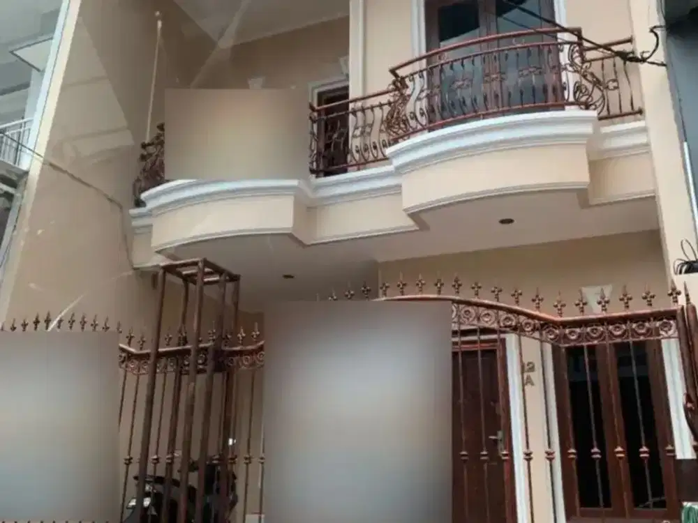 dijual rumah taman surya 3