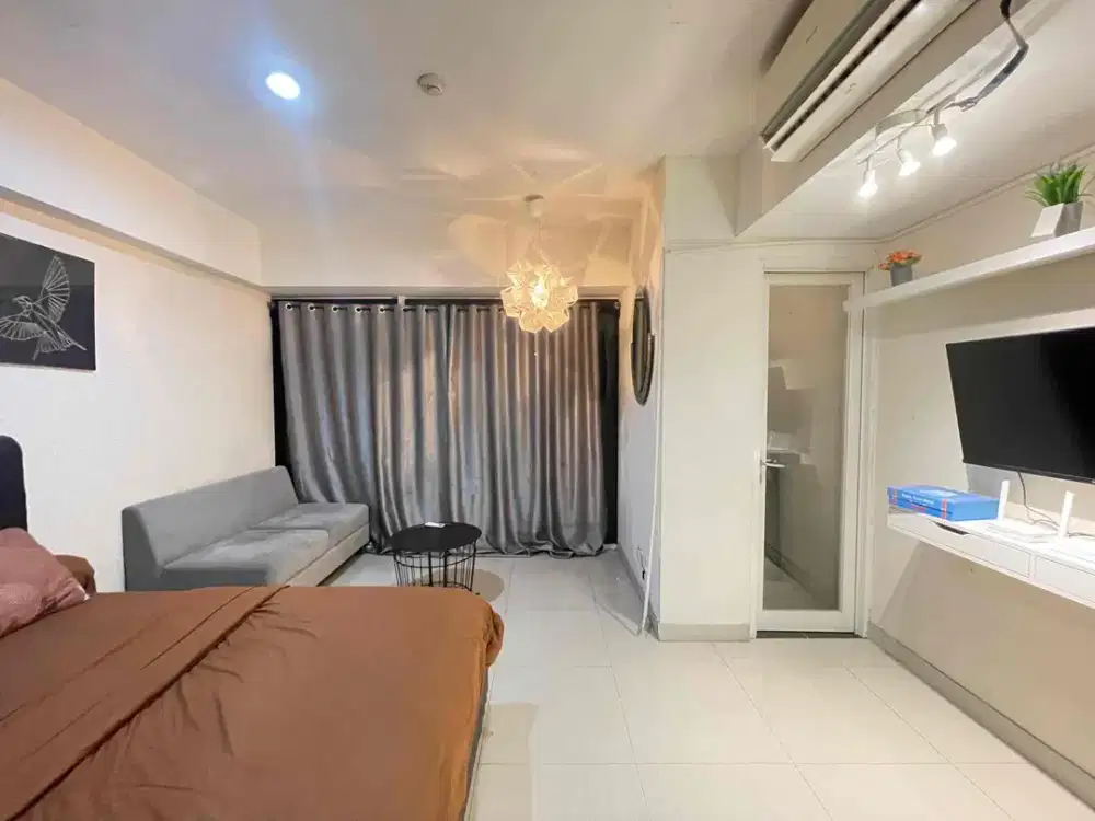 apartemen grand kamala lagoon harian transit mingguan