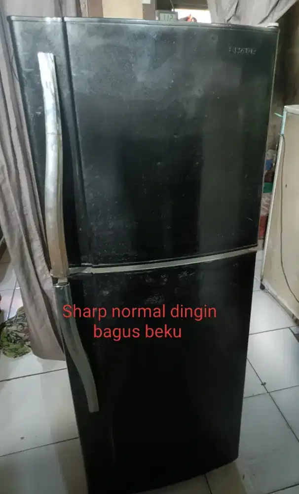 Sharp normal dingin bagus atas bawah