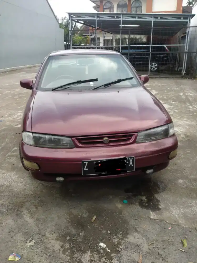 Sedan Timor DOHC 2003 merah metalik