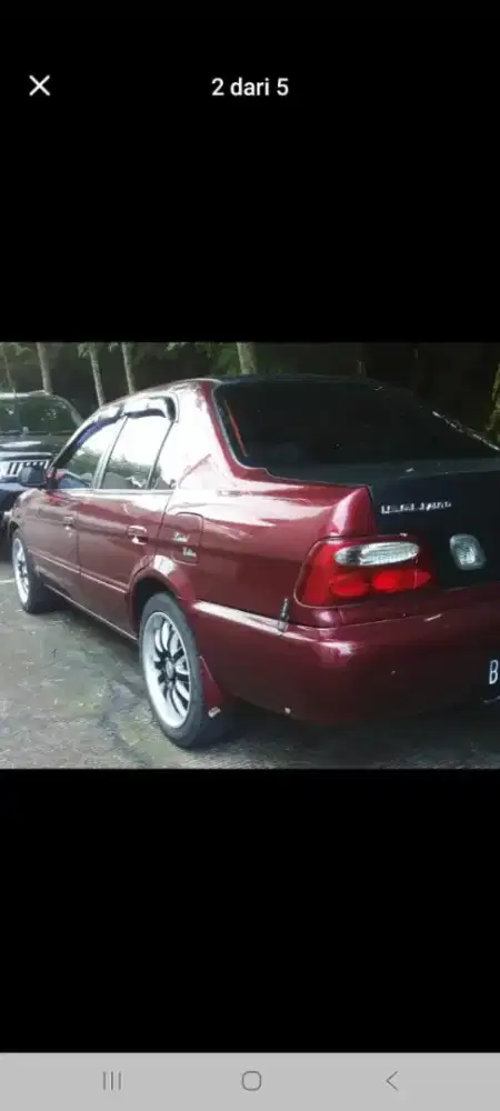 Toyota Soluna gli matic merah