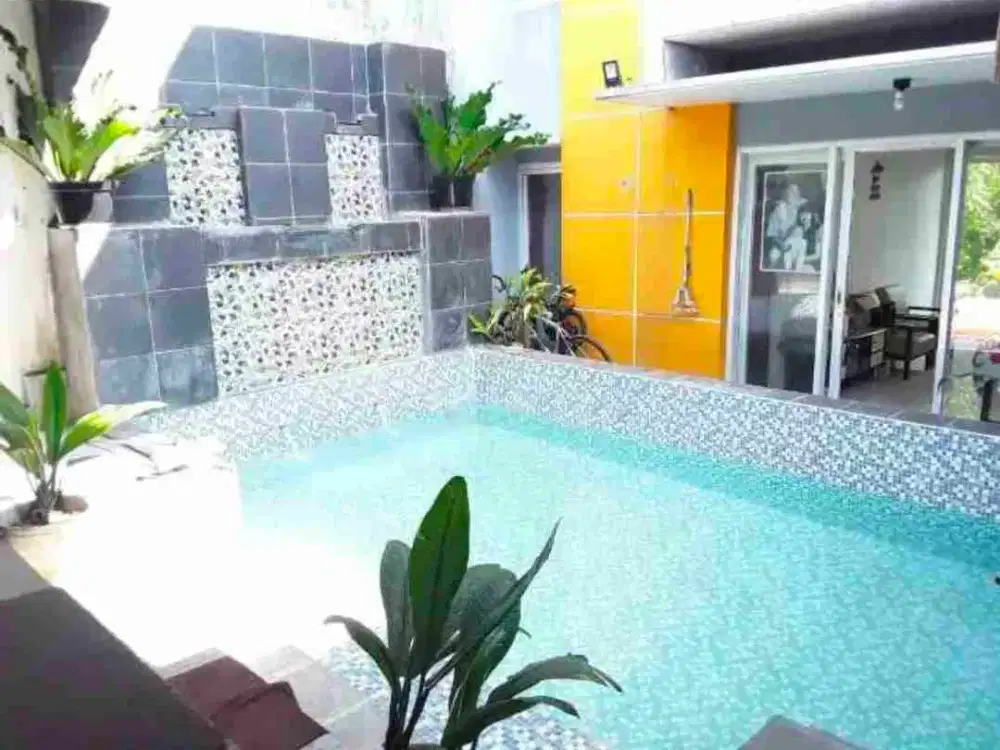 rumah murah 2 lt BU SEGERA ada kolam renang luas tanah 200 dekat jalan tol sawojajar dan bandara pakis