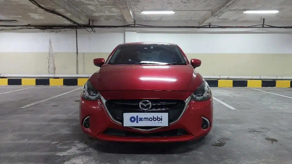 TDP 13JT Mazda 2 1.5 GT Skyactiv Bensin-AT Merah 2023